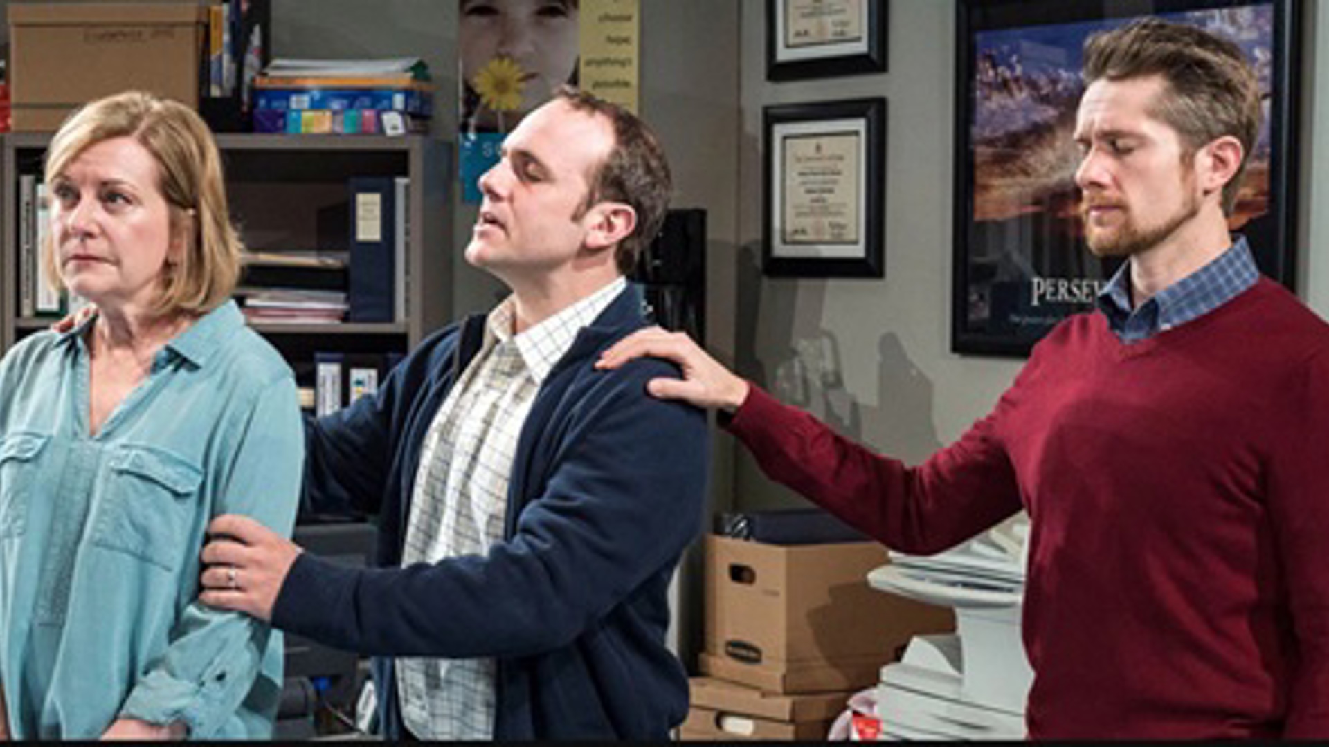 Three actors on stage performing at Kirk Douglas Theatre in a Drama