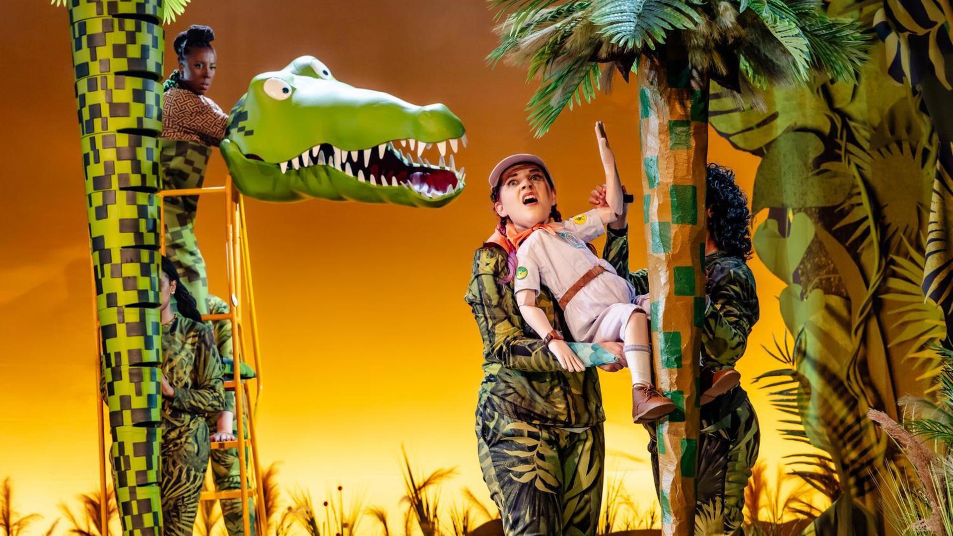The Enormous Crocodile chasing a young girl up a tree.