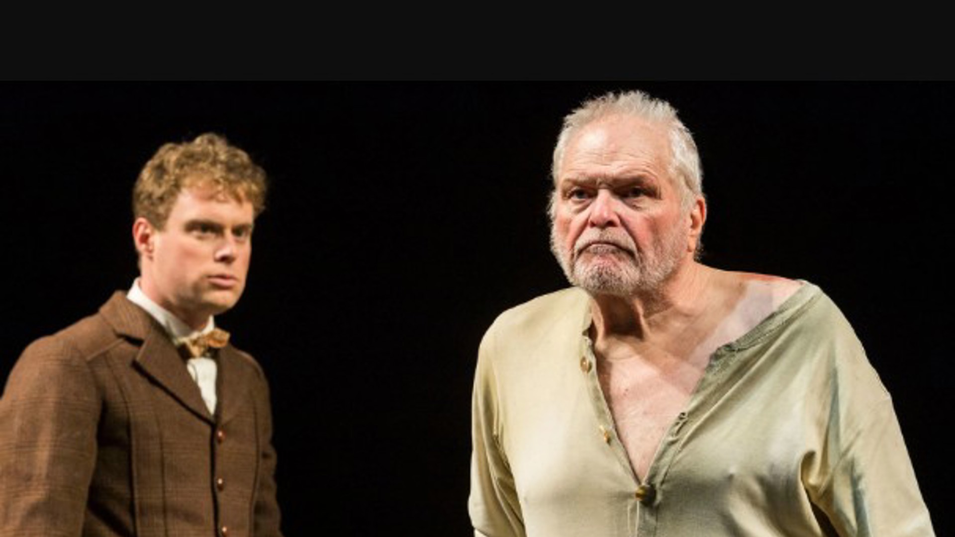 Brian Dennehy and another actor on stage performing in The Steward Of Christendom