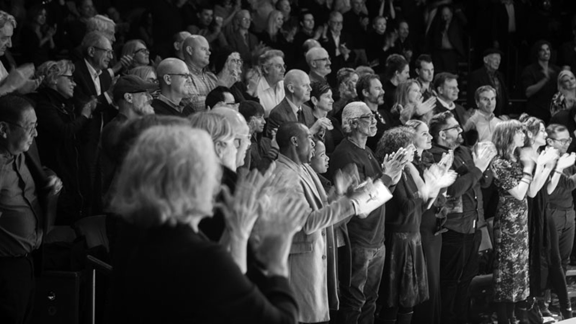 audience giving a standing ovation