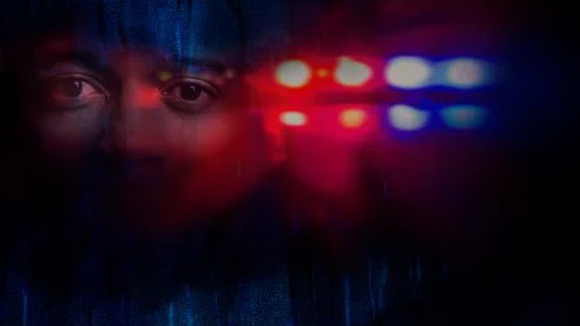 eyes over blurred red and blue lights representing social uprising